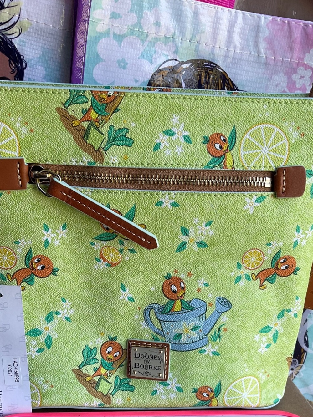 DISNEY DOONEY and BOURKE CROSSBODY ORANGE BIRD NWT ,